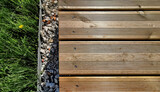 Fragment of the terrace, top view. Contemporary brown wood decking. Place for Copyspace.