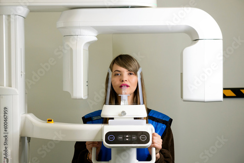 Female patient having computer tomography of jaw