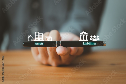 Tableau sur toile balance sheet with assets and liabilities on pen