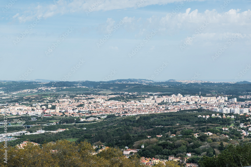 Aerial view of Sintra in Portugal. Old city seen from a distance. Landscape with buildings and woods