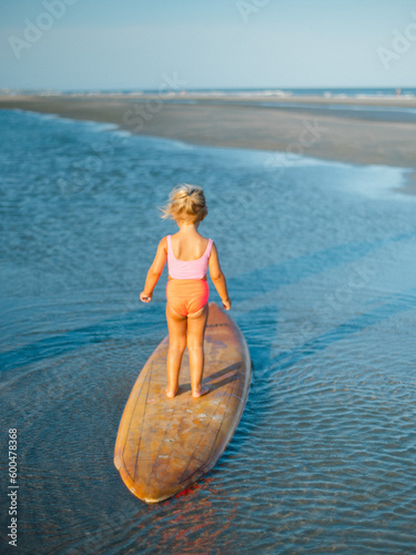 child playing on the beach