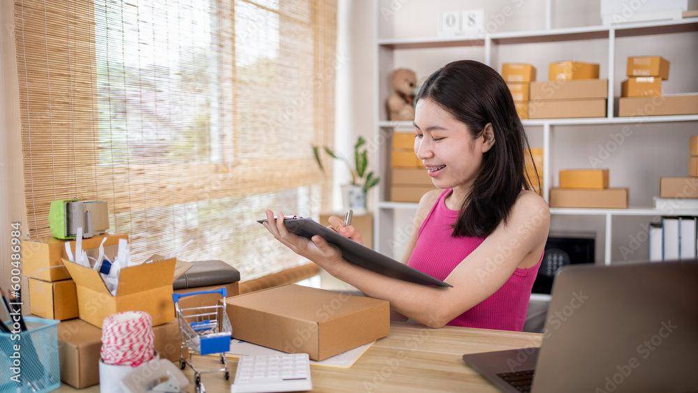 Online selling business, Small business owners are checking inventory in order to prepare them for proper delivery to customers, Online shopping SME entrepreneur, Delivery of goods to consumers. Online selling business, Small business owners are checking inventory in order to prepare them for proper delivery to customers, Online shopping SME entrepreneur, Delivery of goods to consumers.