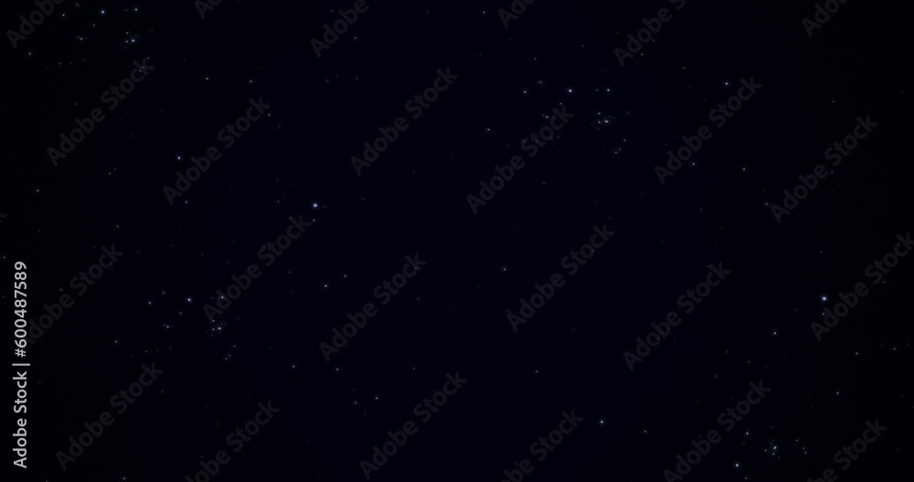 Blue shooting star or comet with particles on a starry background, meteor shower, the appearance and movement of a star, a galaxy on abstract background, neon footprint in space, milky way galaxy..