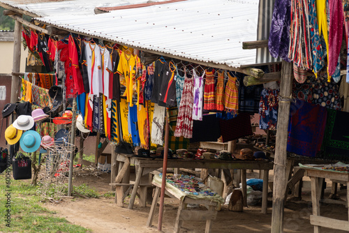 Various goods, including hats, bags and blankets for sale, in Queen Elizabeth National Park © MelissaMN