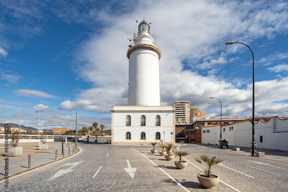 MALAGA, SPAIN - March 08, 2023. Lighthouse Farola in Malaga port