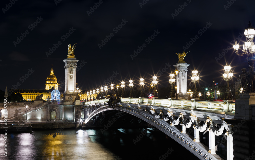 Night view with Seine river and bridge in Paris, France, Europe