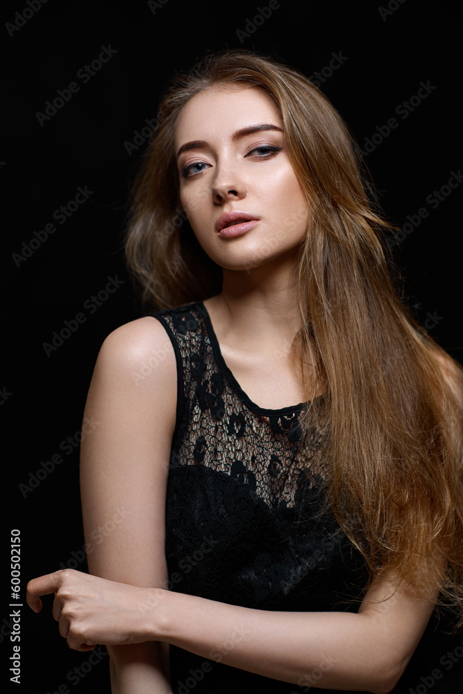 gorgeous brunette woman with long hair in black dress gorgeous brunette woman with long hair in black dress