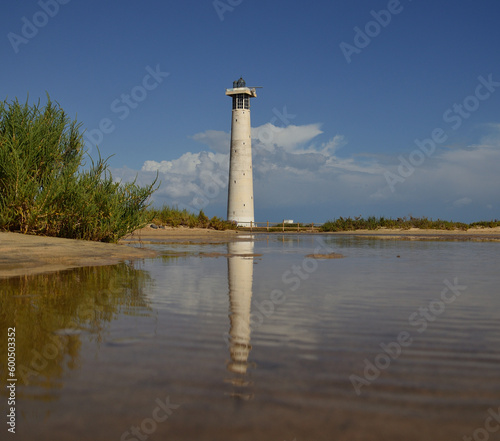 Salt marsh of Jandia and lighthouse of Morro Jable, coast of Fuerteventura, Canary Islands, Spain