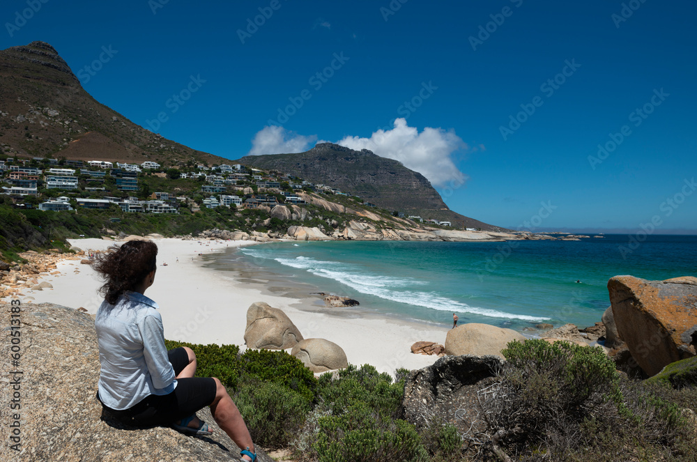 Woman at Llandudno beach, Cape Town South Africa