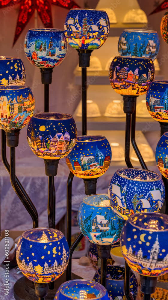 Blue and yellow glass lamp with handmade art during Christmas season in Vienna, Austria