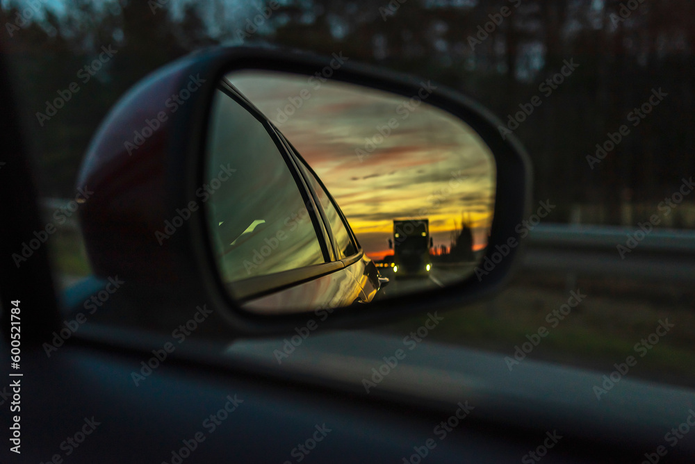 Reflected road in rearview mirror