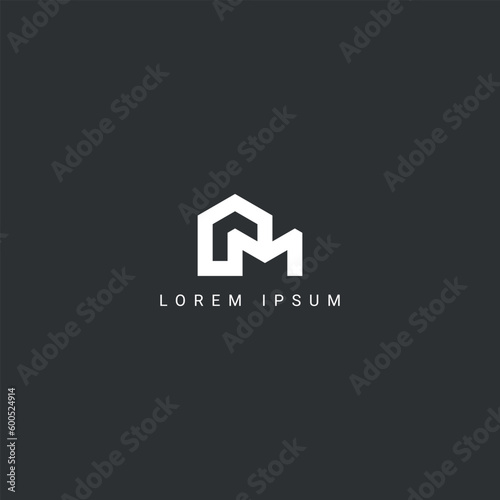 Abstract letter M real estate house logo design vector element