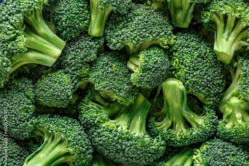 Macro photo green fresh vegetable broccoli. Fresh green broccoli on a black stone table.Broccoli vegetable is full of vitamin.Vegetables for diet and healthy eating.Organic food.