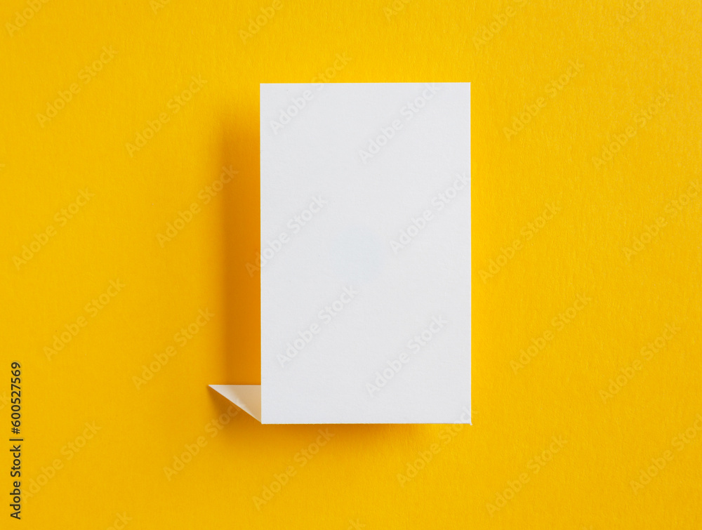 paper speech bubble on yellow background paper speech bubble on yellow background