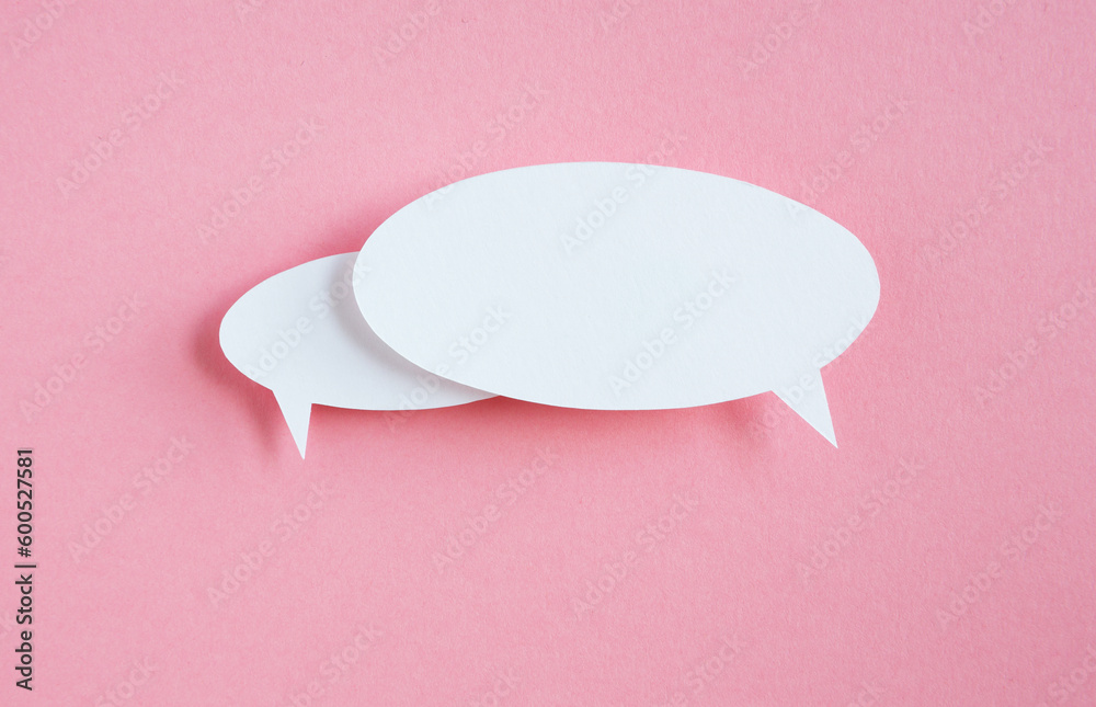 paper speech bubble on pink background paper speech bubble on pink background
