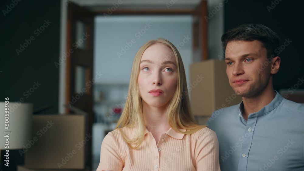 Woman suffering man quarrel at home close up. Husband arguing with young wife.