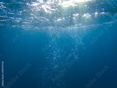 Bubbles under the sea in the crystal clear green sea water. Mediterranean bubbles. Real image very suitable for backgrounds, Rising Bubbles in Deep Underwater, Under with bubble. Great for background.