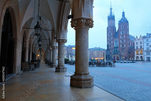 Looking toward St Marys Basilica from the Arches of the Cloth Hall. Krakow, Poland, Europe.