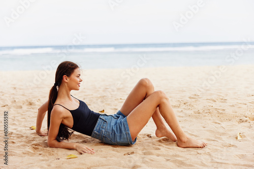 travel woman sea sand freedom sitting smile beach nature vacation tropical
