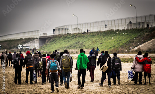 Refugee odyssey in Europe. Refugees are people who have fled war, violence, conflict or persecution and have crossed an international border to find safety in another country photo