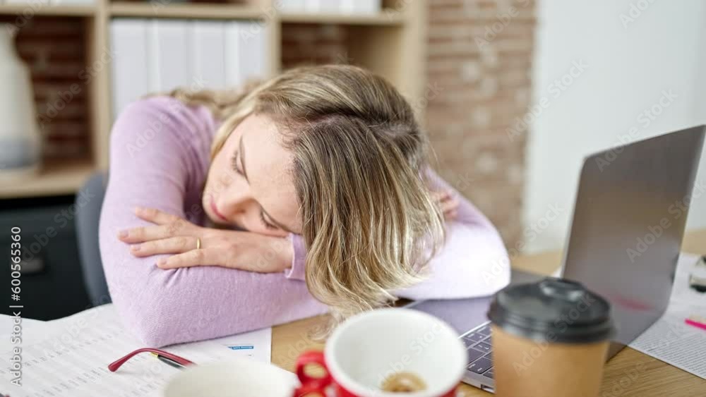 Young blonde woman business worker tired sleeping at office Young blonde woman business worker tired sleeping at office
