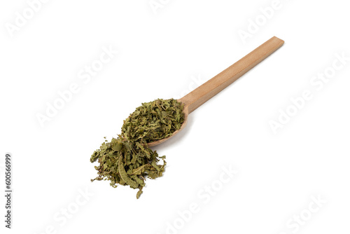 Dried leaves o Lemon verbena in latin Aloysia citrodora on wooden spoon isolated on white background. Medicinal. herb. Lemon verbena leaf extract is used for its energizing and refreshing properties