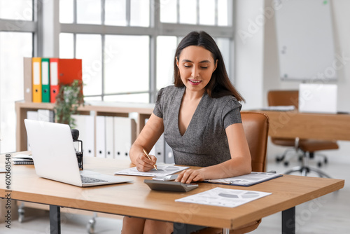 Female accountant working w...