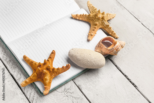 Open notebook with starfish...