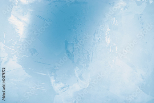 Close up surface of a blue ice cube, macro photography