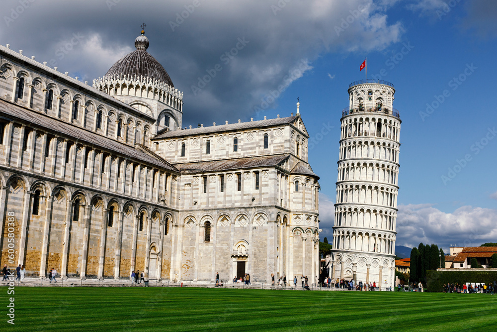 Dramatic clouds over the famous Pisa Tower. One of the most popular tourist places in the world.