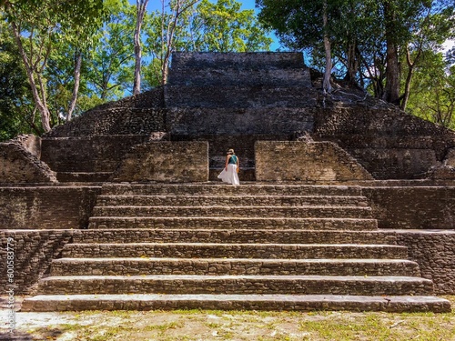 Tourist exploring Cahal Pech Mayan Ruin, San Ignacio, Belize