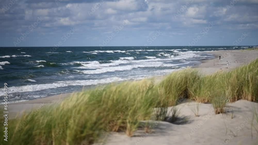 Strong waves on the Baltic Sea shore, chilly summer day Strong waves on the Baltic Sea shore, chilly summer day