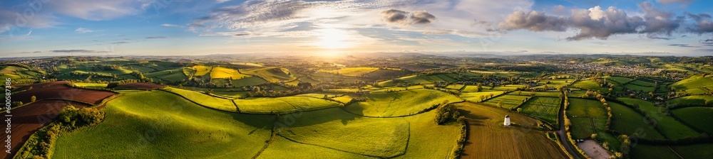 Sunset over Fields and Farmlands in spring from a drone, Devon, England,  Europe - obrazy, fototapety, plakaty 