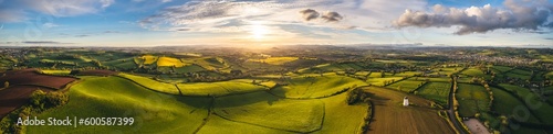 Sunset over Fields and Farmlands in spring from a drone, Devon, England, Europe