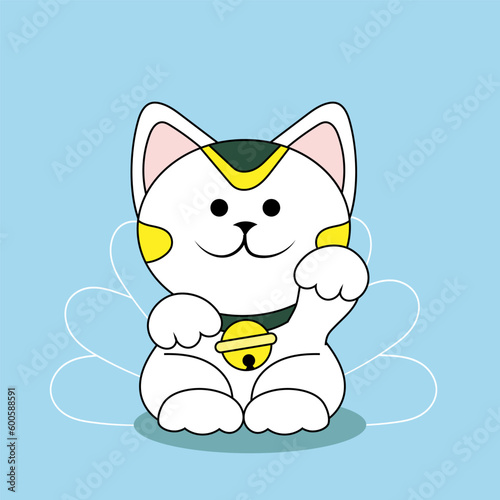 Cute maneki neko (beckoning cat) on light blue background