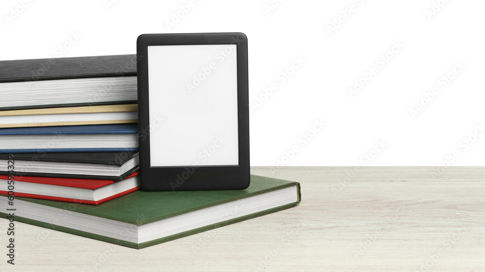 Stack of hardcover books and modern e-book on wooden table against white background. Space for text Stack of hardcover books and modern e-book on wooden table against white background. Space for text