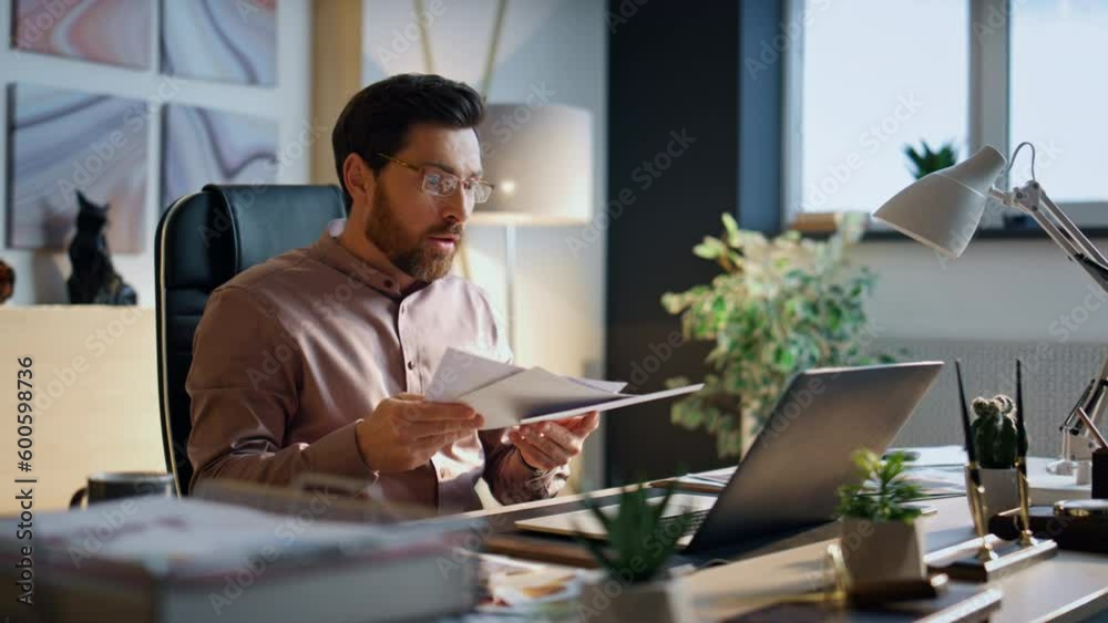 Angry boss video calling using laptop in office close up. Manager arguing online Angry boss video calling using laptop in office close up. Manager arguing online