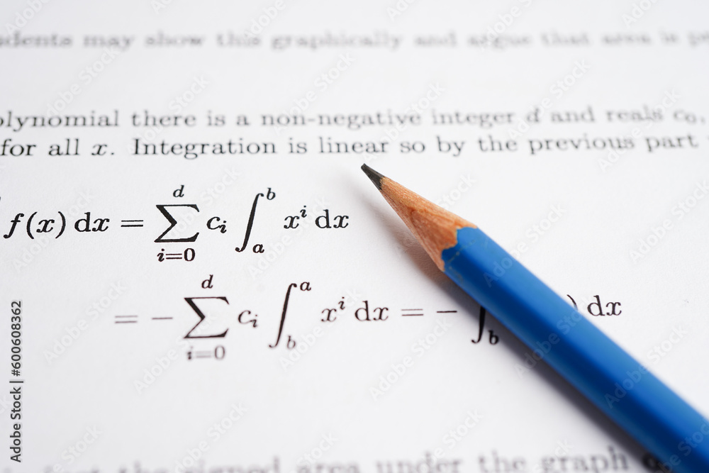 Pencil on mathematic formula exercise test paper in education school. Pencil on mathematic formula exercise test paper in education school.