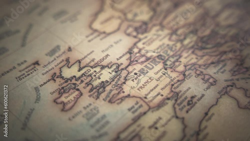 United Kingdom and Ireland on a vintage political world map. Slow motion, tracking arc shot. 