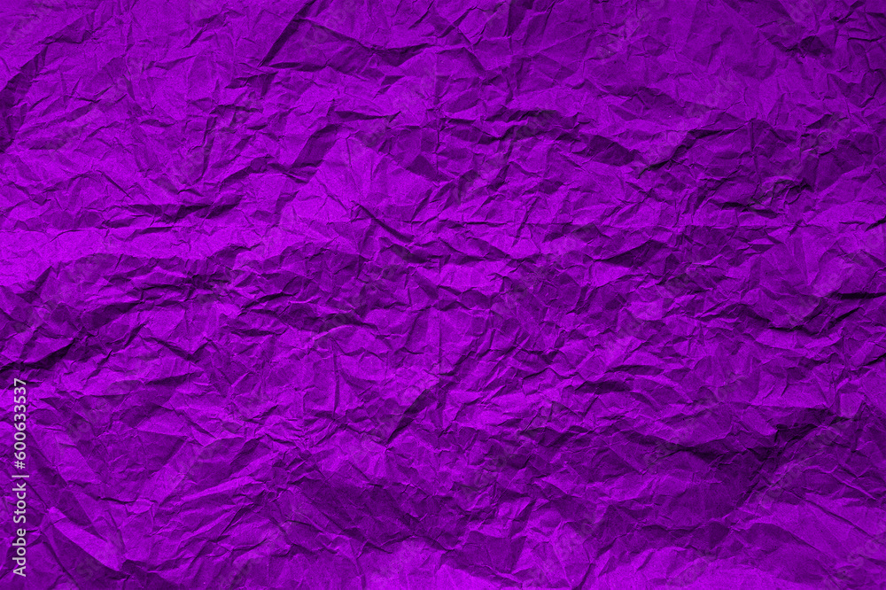 Natural abstract textured background of wrinkled purple paper.