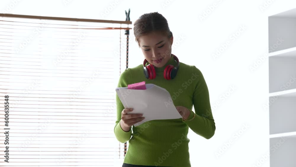 Stressed woman at home, studying and analyze house bills and submitting tax forms Stressed woman at home, studying and analyze house bills and submitting tax forms