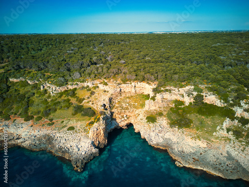 Salento,  porto selvaggio, grotta centrale della baia di torre uluzzo - nardò, lecce, puglia, italy photo