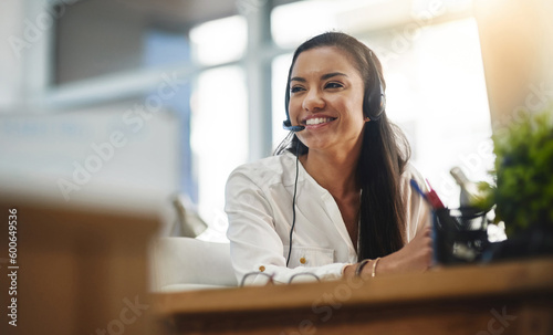 Communication, crm or happy woman in call center consulting, speaking or talking at customer services. Virtual assistant, friendly or sales consultant in telemarketing or telecom company help desk