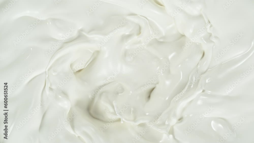 Super Slow Motion Shot of Swirling Fresh Cream at 1000fps. Super Slow Motion Shot of Swirling Fresh Cream at 1000fps.