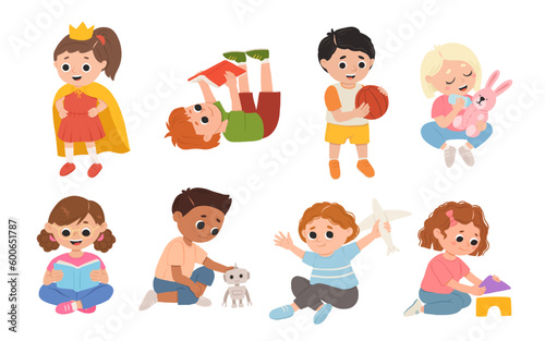 Children, kids play together having fun, fooling around in fine good mood, on playroom, playground. Preschool kids have fun. Children's activity in the kinder garden, primary school.