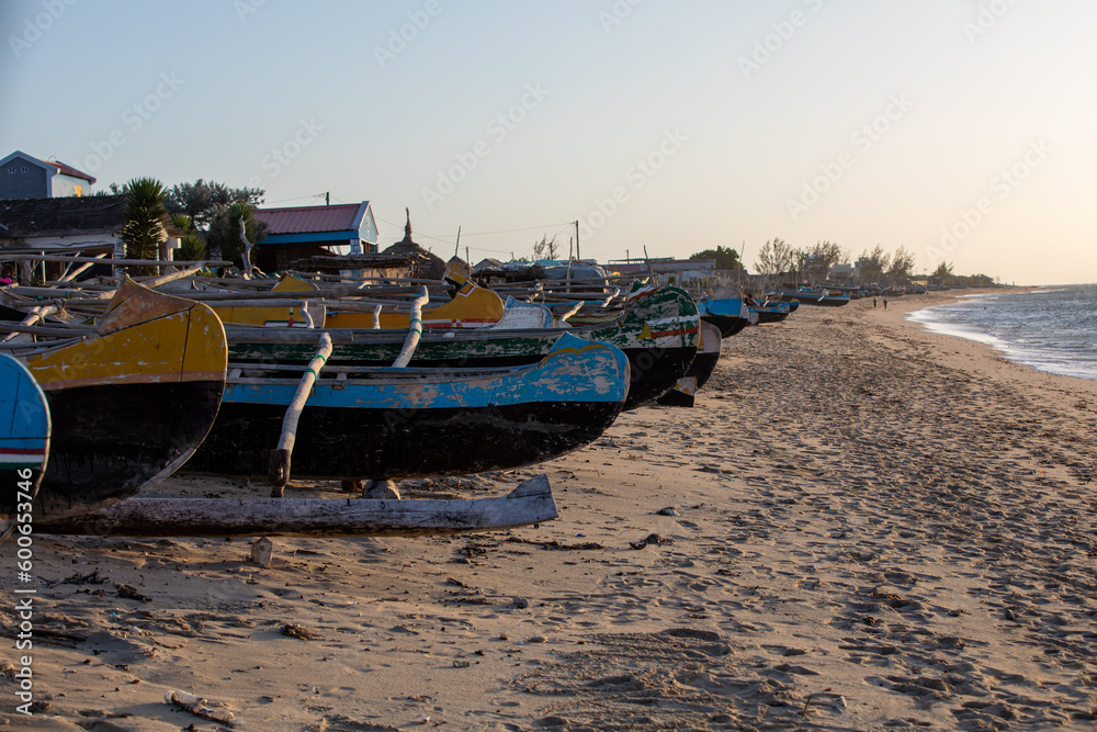 Traditional wooden fishing boats on the tropical beach of Anakao, Tulear, Madagascar. Ocean view with sandy beach