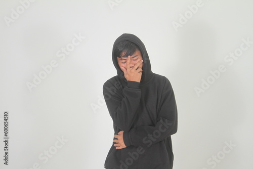 expressive Indonesian man smiling on white background isolated 