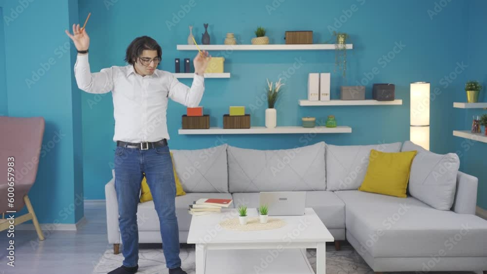 Funny man is conducting music at home. Fun video. Funny man is conducting music at home. Fun video.