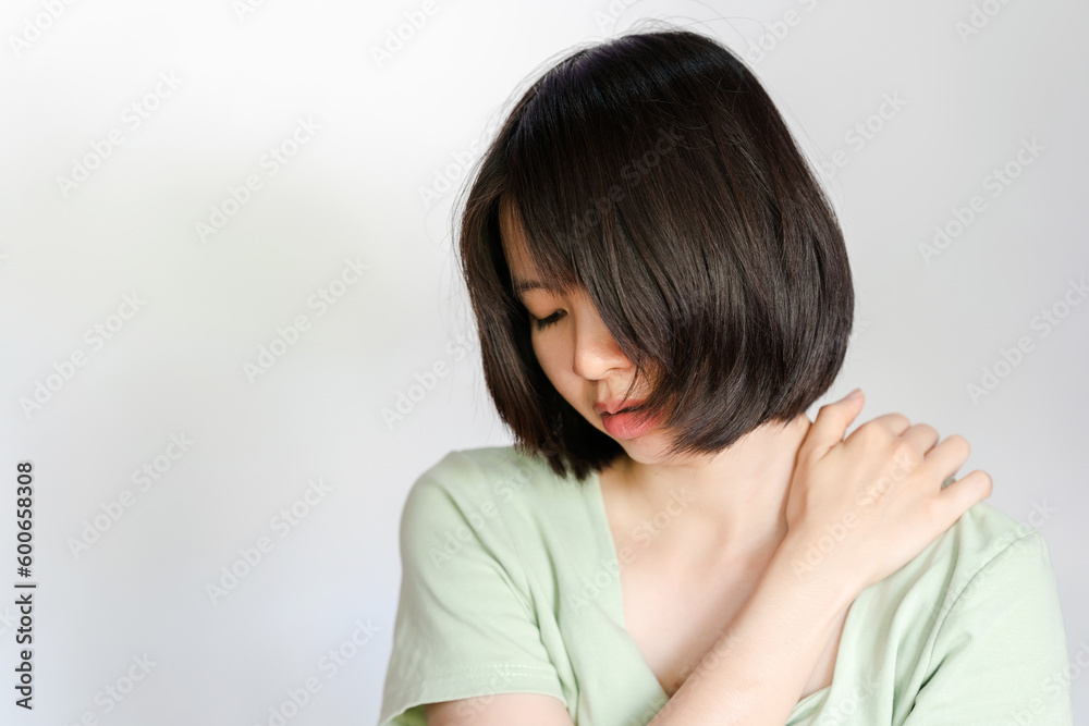 Woman showing pain in shoulder because of muscle inflammation. Woman showing pain in shoulder because of muscle inflammation.
