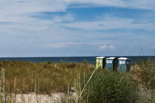 Three PORTABLE TOILET on the Beach  Warnem  nde Germany